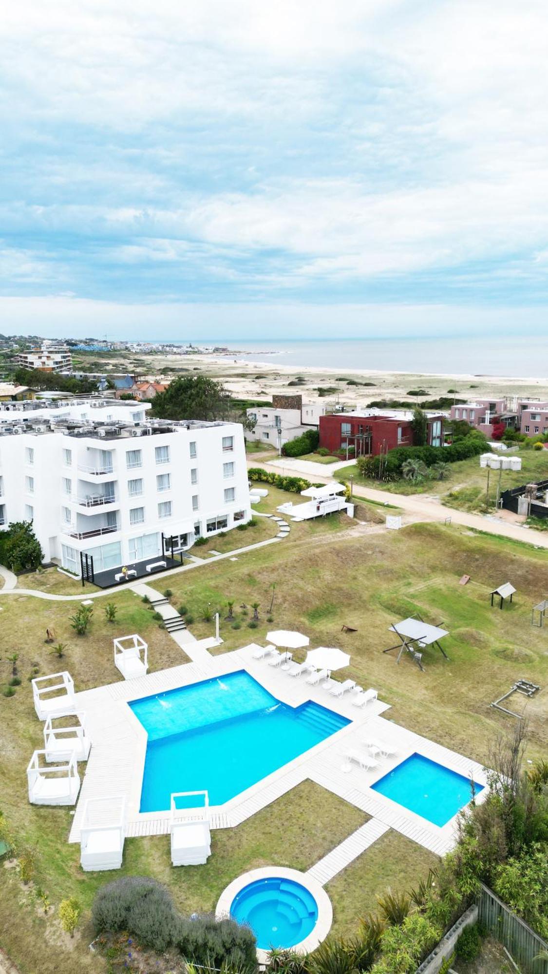Hotel Las Olas Resort Manantiales Bagian luar foto